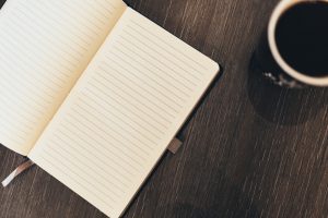 journal and coffee
