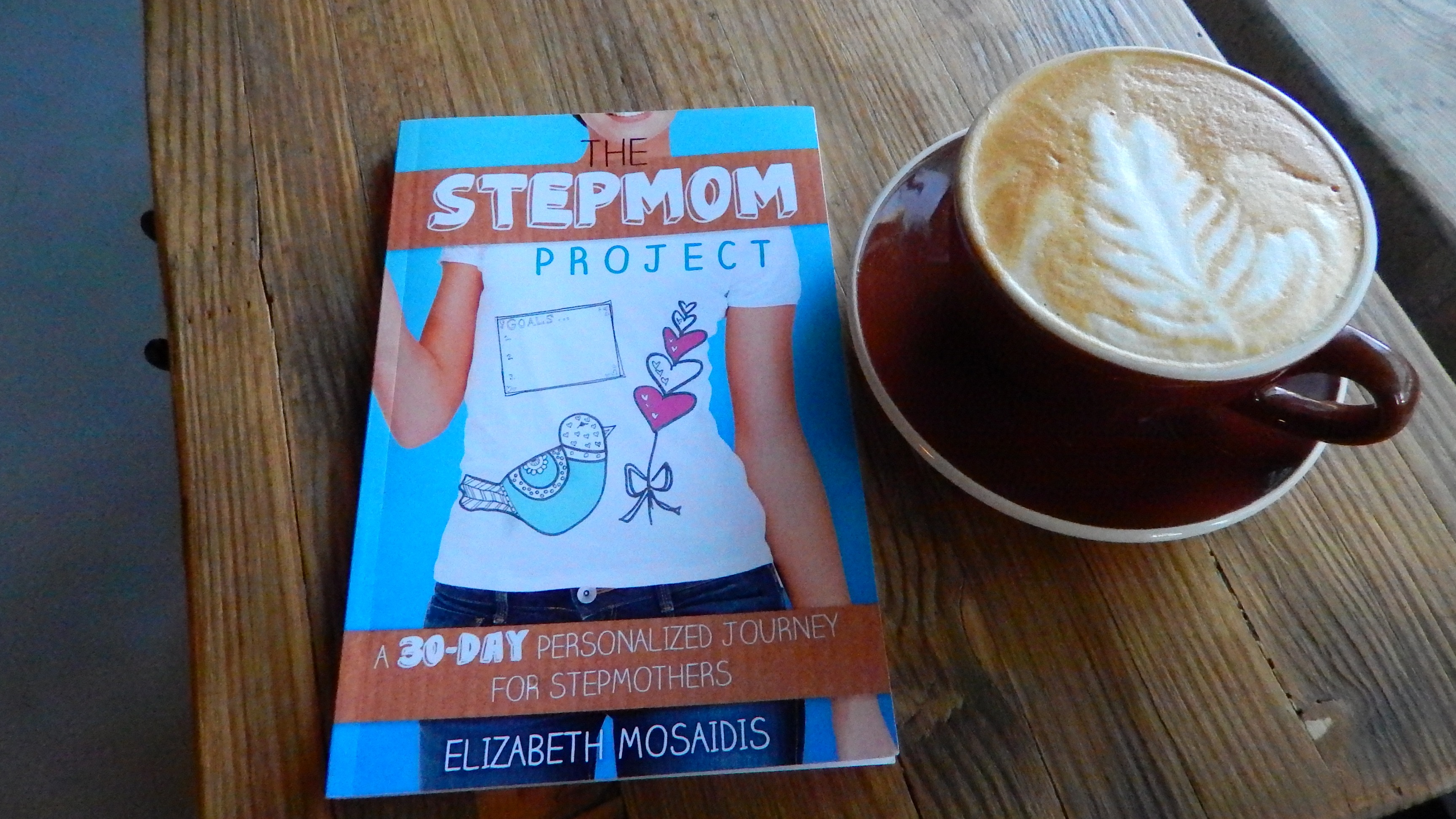 Cafe latte and book