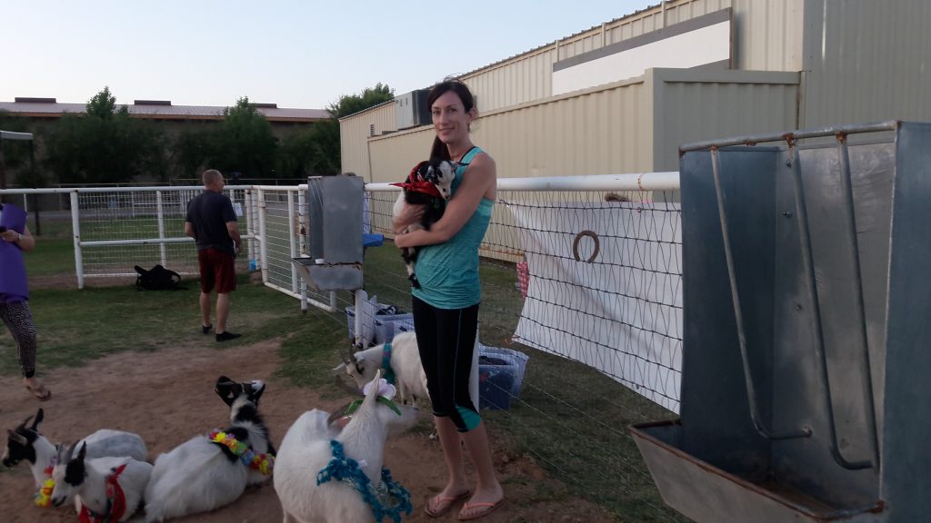 holding a goat