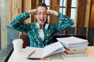 College student sitting at a desk