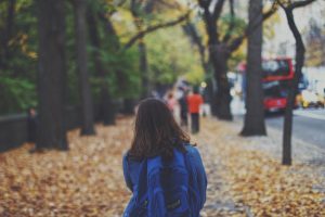 girl standing outside school worried about grades