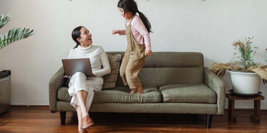 woman talking to her child about tips to organize her home and life